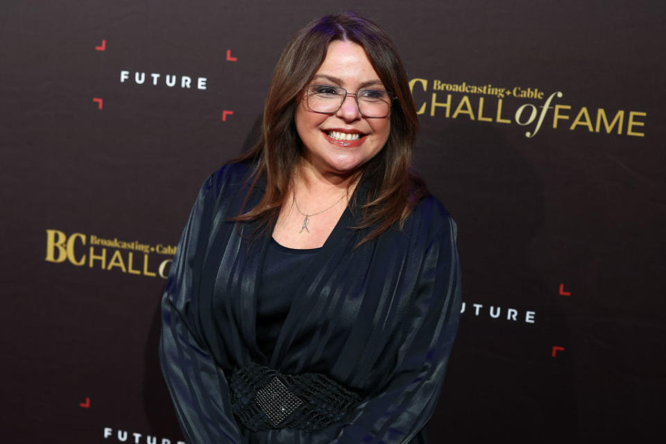 Rachael smiling at a Broadcasting & Cable Hall of Fame event, wearing a dark shawl over a blouse