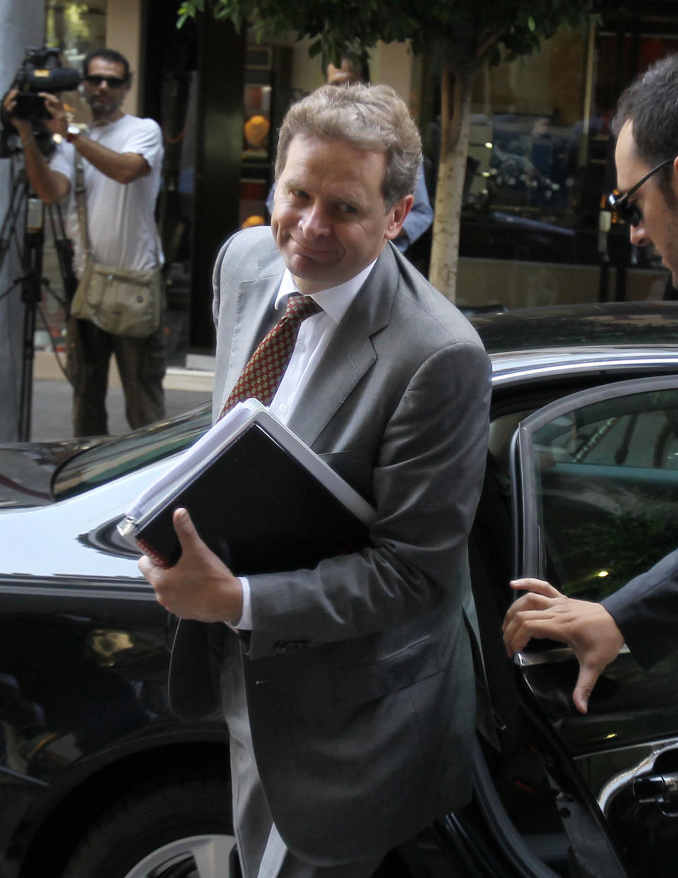 International Monetary Fund (IMF) mission chief Poul Thomsen arrives for a meeting between Greece's new finance minister Yannis Stournaras and the debt inspectors from the European Central Bank, European Commission and International Monetary Fund, known as the troika at Greece's Finance ministry in Athens, Thursday, July 26, 2012. Inspectors overseeing Greece's faltering financial recovery return to Athens as the country again has its back to the wall.(AP Photo/Thanassis Stavrakis)