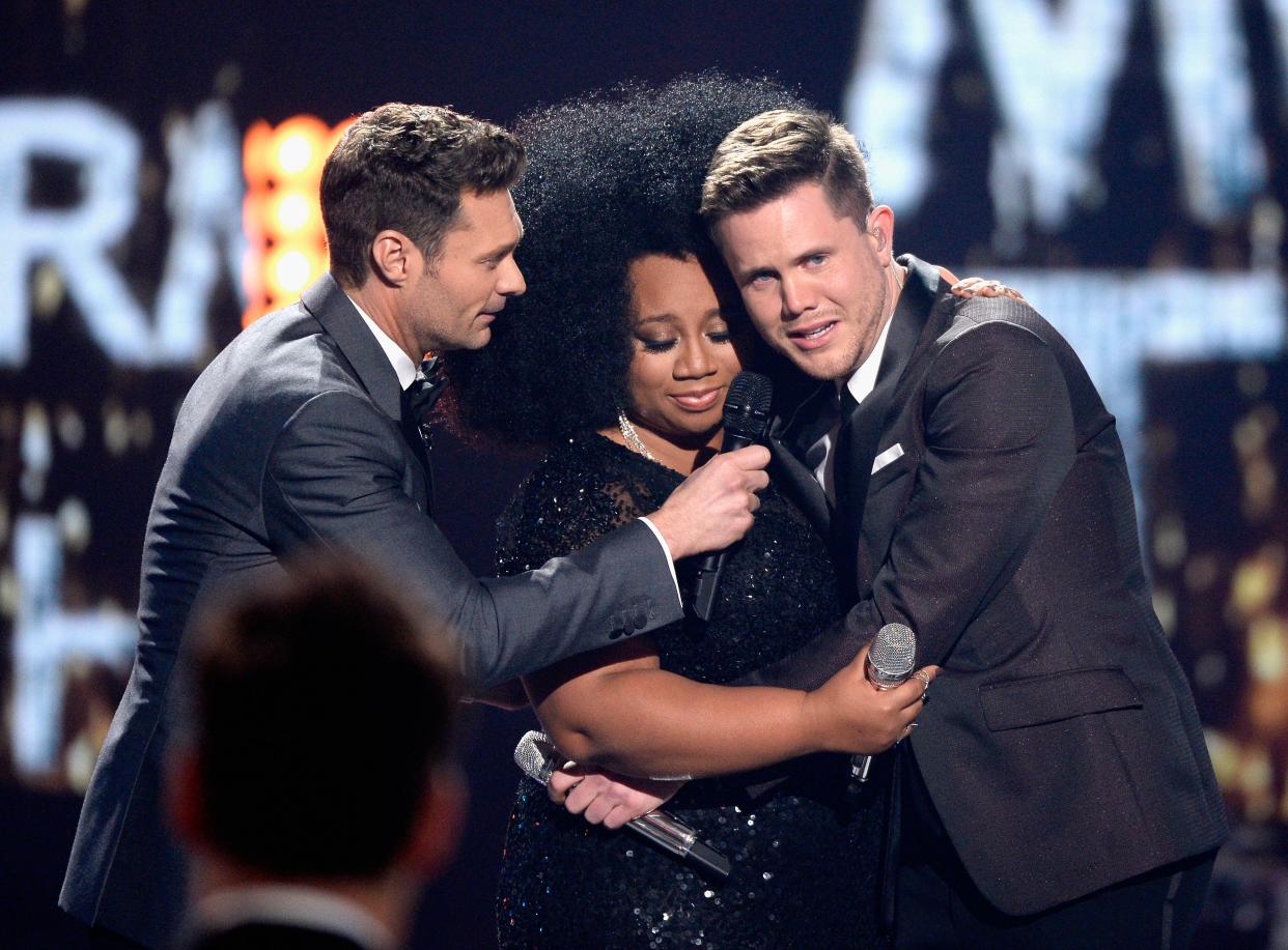 American Idol Season 15 winner Trent Harmon (R), host Ryan Seacrest (L) and finalist La'Porsha Renae speak onstage during FOX's "American Idol" Finale For The Farewell Season at Dolby Theatre on April 7, 2016 in Hollywood, California.