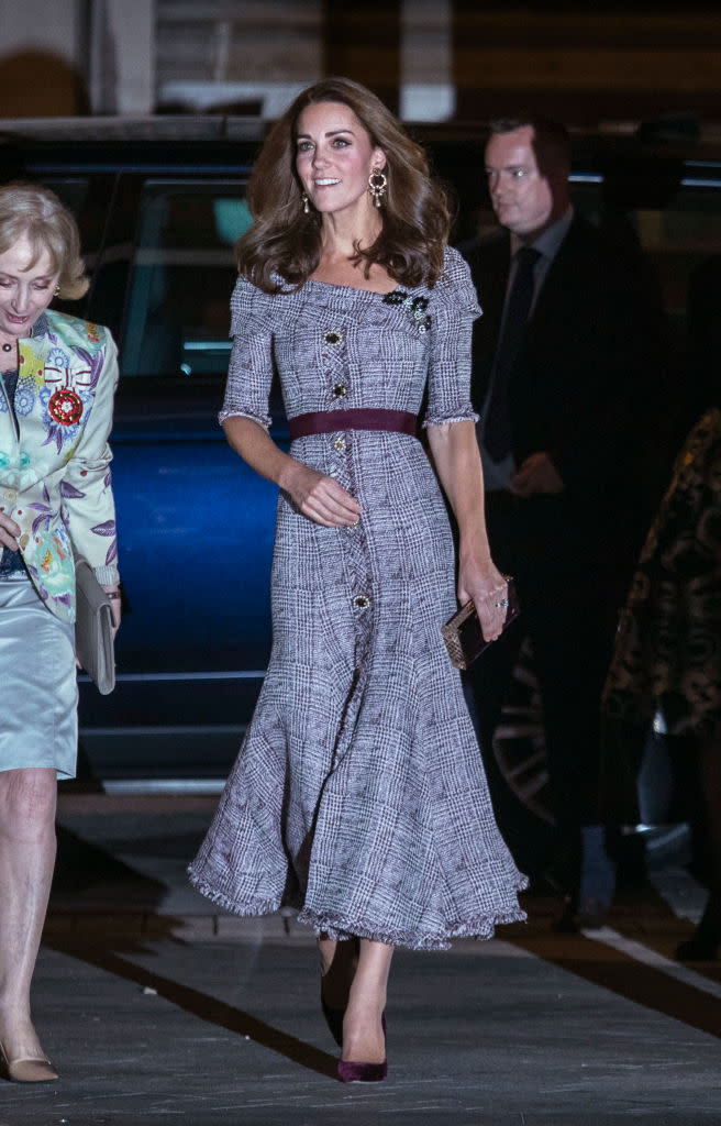 <p>On October 10, the Duchess of Cambridge wore an off-the-shoulder £1,395 dress by Erdem to open the Victoria and Albert Museum’s new photography centre. She finished the ensemble with Erdem earrings and a pair of velvet heels by Jimmy Choo. <em>[Photo: Getty]</em> </p>