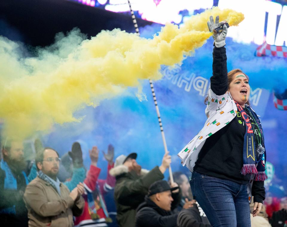 Memphis 901 FC fans use smoke bombs to mark the start of the season before a game Saturday, March 12, 2022, at AutoZone Park. The Memphis 901 FC fell to the Pittsburgh Riverhounds SC 3-0. 