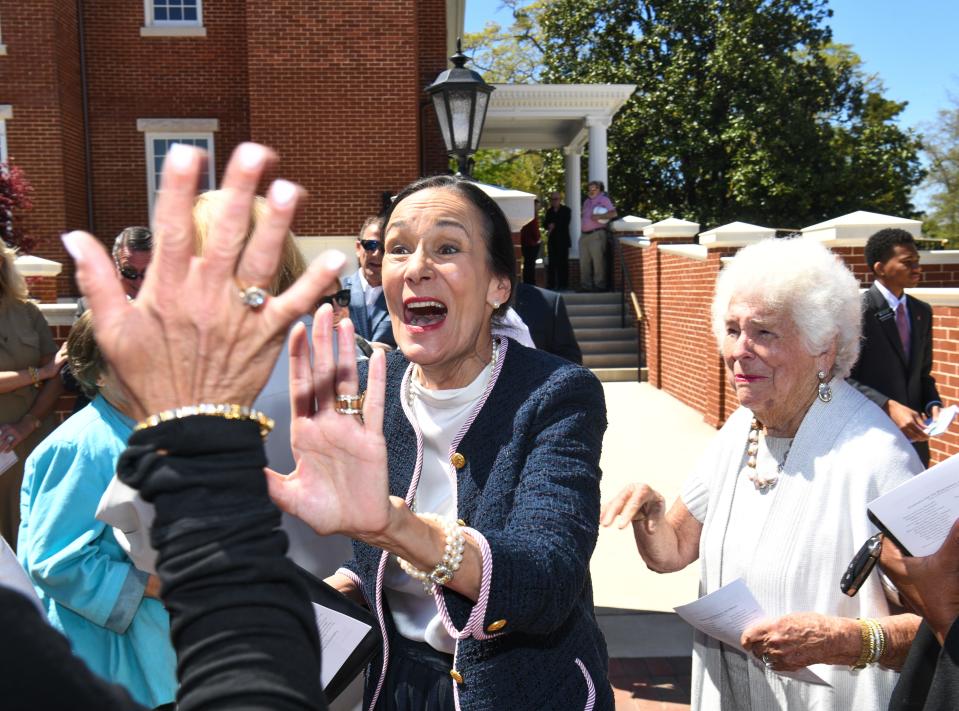 The University of Alabama celebrated the groundbreaking for the Catherine and Pettus Randall Welcome Center at the historic Bryce Hospital building Friday, April 1, 2022. Cathy Randall greets friends before the ceremony. Gary Cosby Jr./Tuscaloosa News