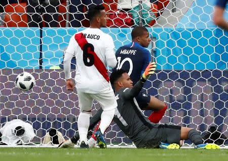 Soccer Football - World Cup - Group C - France vs Peru - Ekaterinburg Arena, Yekaterinburg, Russia - June 21, 2018 France's Kylian Mbappe celebrates scoring their first goal REUTERS/Damir Sagolj