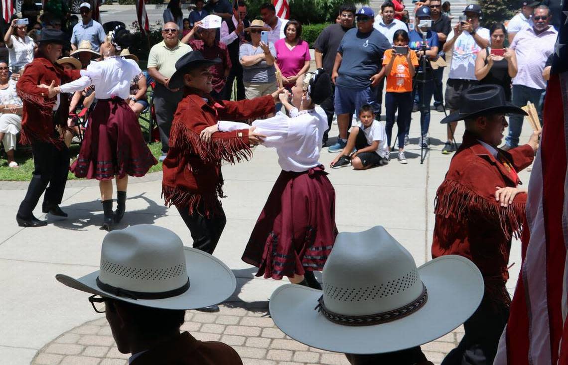 Ballet Folklórico Guadajalara performs a polka from northern México during its participation at the Memorial Day ceremony at Courthouse Park in Madera on May 29, 2023.