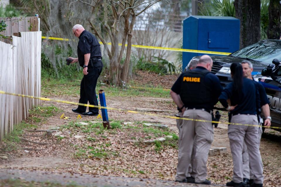 Tallahassee Police officers work the scene of a shooting that occurred on North Monroe Street on Friday afternoon, March 8, 2024.