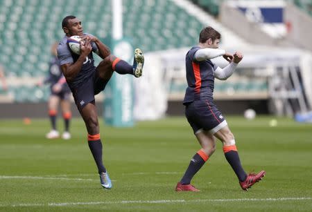 Britain Rugby Union - England Training - Twickenham Stadium - 18/11/16 England's Semesa Rokoduguni and Elliot Daly during training Action Images via Reuters / Henry Browne