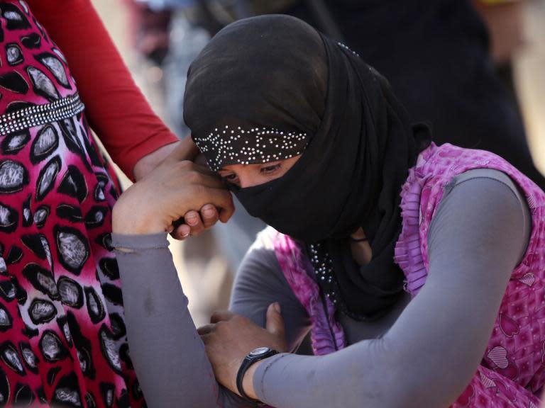 Isis fed baby to its mother and raped a 10-year-old girl to death in front of family, Iraqi MP claims