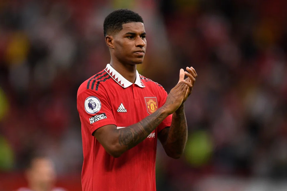 Manchester United's English striker Marcus Rashford applauds supporters as he leaves after the English Premier League football match between Manchester United and Arsenal at Old Trafford in Manchester, north west England, on September 4, 2022. - Man Utd won the game 3-1. - RESTRICTED TO EDITORIAL USE. No use with unauthorized audio, video, data, fixture lists, club/league logos or 'live' services. Online in-match use limited to 120 images. An additional 40 images may be used in extra time. No video emulation. Social media in-match use limited to 120 images. An additional 40 images may be used in extra time. No use in betting publications, games or single club/league/player publications. (Photo by Oli SCARFF / AFP) / RESTRICTED TO EDITORIAL USE. No use with unauthorized audio, video, data, fixture lists, club/league logos or 'live' services. Online in-match use limited to 120 images. An additional 40 images may be used in extra time. No video emulation. Social media in-match use limited to 120 images. An additional 40 images may be used in extra time. No use in betting publications, games or single club/league/player publications. / RESTRICTED TO EDITORIAL USE. No use with unauthorized audio, video, data, fixture lists, club/league logos or 'live' services. Online in-match use limited to 120 images. An additional 40 images may be used in extra time. No video emulation. Social media in-match use limited to 120 images. An additional 40 images may be used in extra time. No use in betting publications, games or single club/league/player publications. (Photo by OLI SCARFF/AFP via Getty Images)