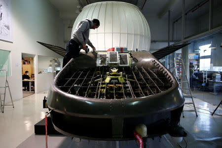 A worker works on a prototype of the Cormorant, a drone, at Urban Aeronautics' workshop in Yavne, Israel December 22, 2016. REUTERS/Amir Cohen