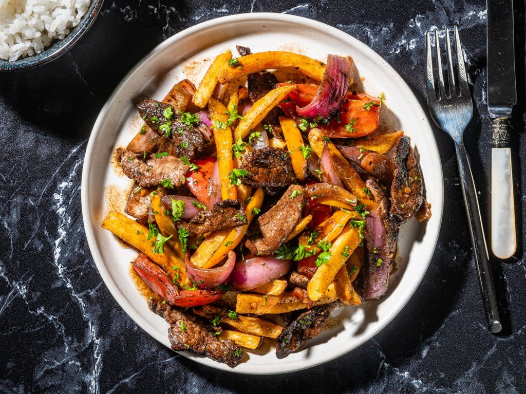 Classic lomo saltado is a literal translation of its Spanish name: a beef stir-fry (Rey Lopez/The Washington Post)
