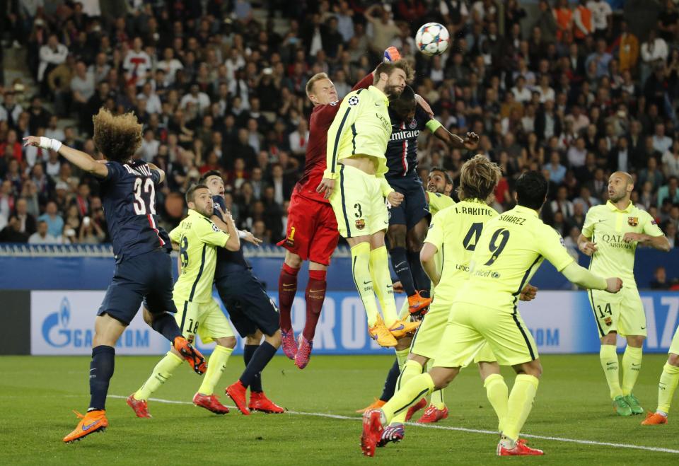 Football - Paris St Germain v FC Barcelona - UEFA Champions League Quarter Final First Leg - Parc des Princes, Paris, France - 15/4/15 Barcelona's Marc Andre ter Stegen punches clear Reuters / Christian Hartmann