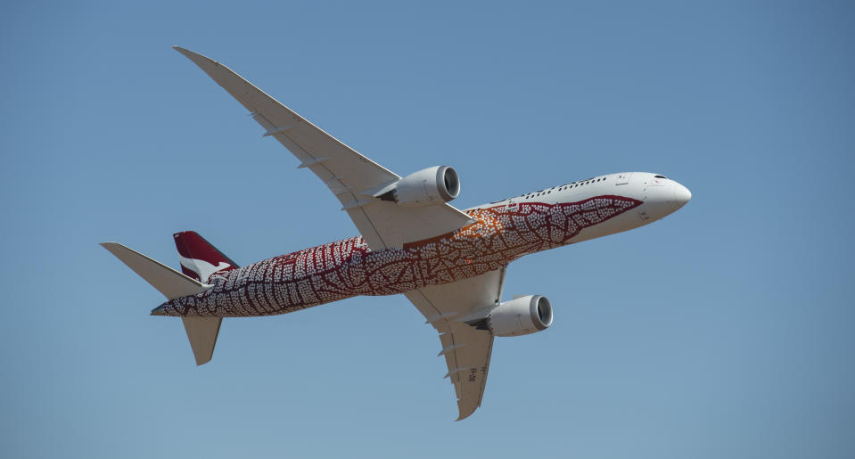 ALICE SPRINGS, AUSTRALIA - MARCH 02:  A newly painted Qantas Boeing 787 Dreamliner aircraft takes part in an air to air filming shoot on March 2, 2018 in Alice Springs, Australia. The special livery honours the work of late Northern Territory artist and Anmatyerre woman, Emily Kame Kngwarreye. It is based on her 1991 painting, Yam Dreaming, signifying the importance of the yam plant as a staple food source in her home region of Utopia, 230km north-east of Alice Springs.  (Photo by James D. Morgan/Getty Images)