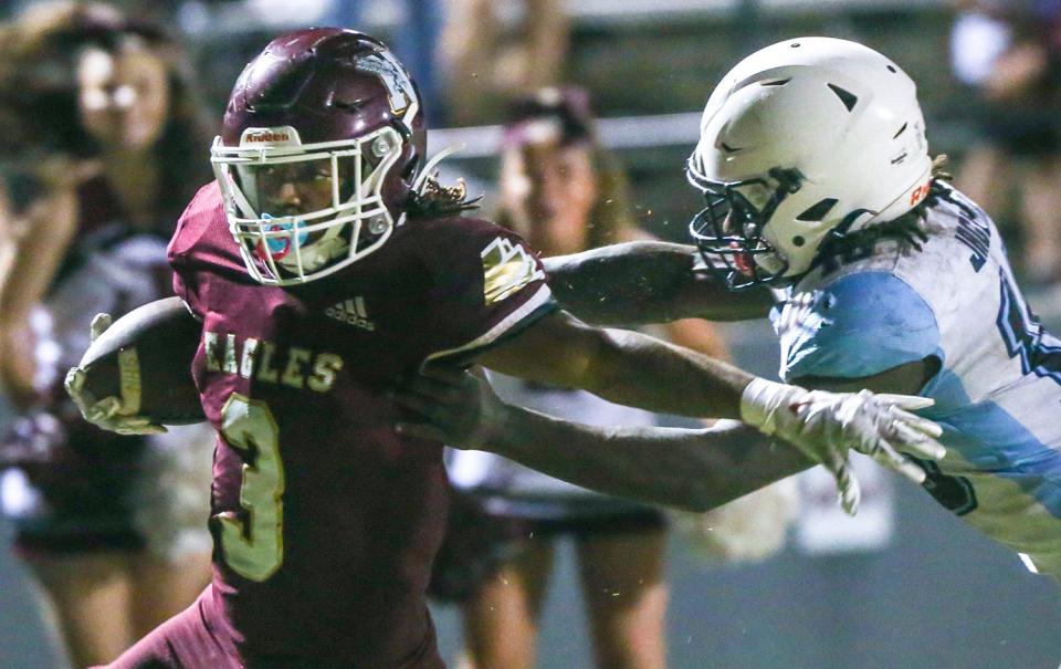 Niceville Rb Micah Turner is pushed out of bounds just short of the goal line during the Niceville homecoming football game against Gadsden County.