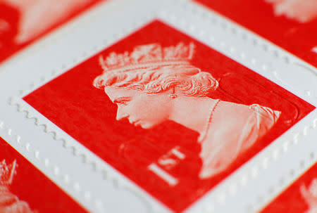 FILE PHOTO: A book of first class postage stamps in Manchester, Britain, September 12, 2013. REUTERS/Phil Noble/File Photo