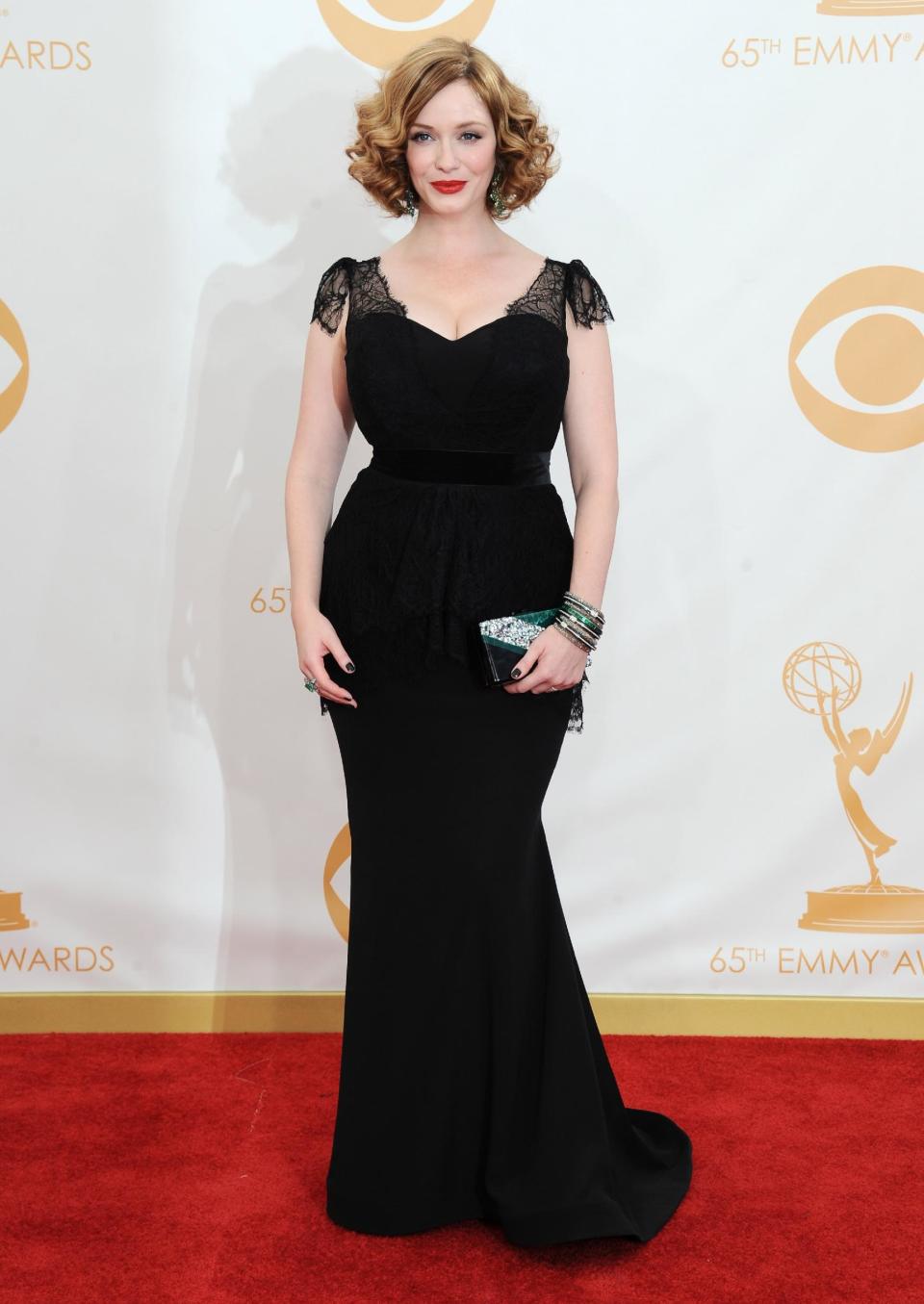 Christina Hendricks arrives at the 65th Primetime Emmy Awards at Nokia Theatre on Sunday Sept. 22, 2013, in Los Angeles. (Photo by Jordan Strauss/Invision/AP)