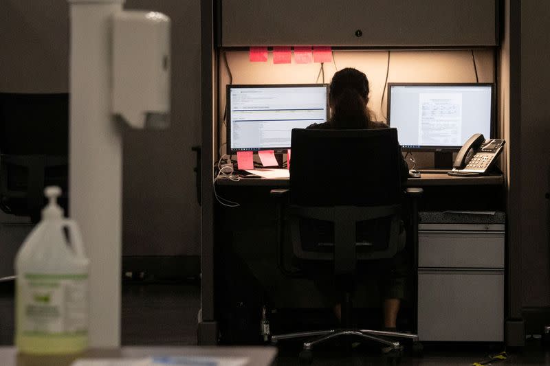 FILE PHOTO: Contact tracer with Houston Health Department monitors spread of coronavirus disease outbreak in Houston