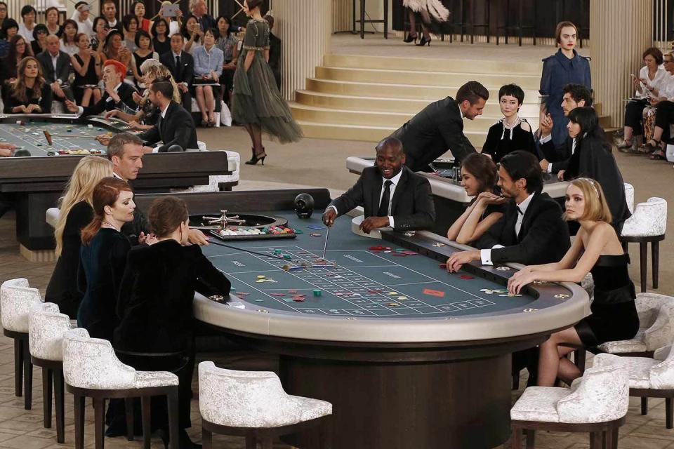 <p>This show was worth the gamble. Taking centre stage at the Couture Fall show actors Julianne Moore and Kristen Stewart kicked off the Chanel casino with a round of blackjack before models made their way to the runway - and by runway we mean the casino floor. </p>