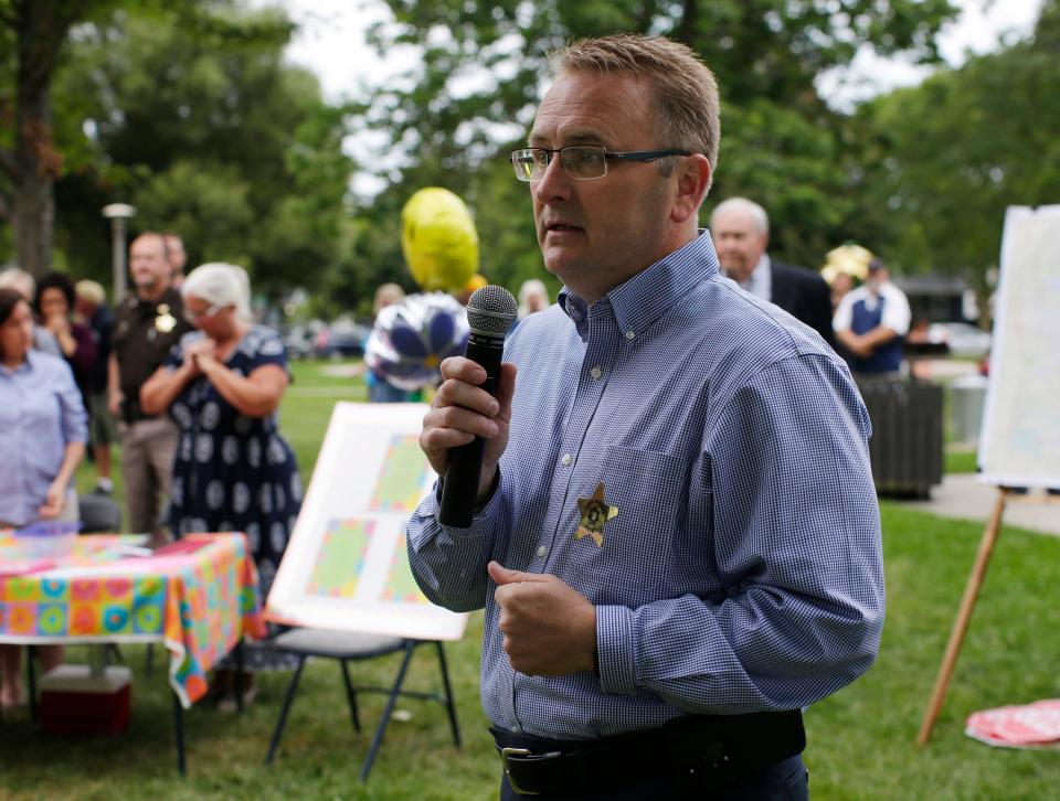 Sheboygan Police Chief Christopher Domagalski speaks during National Night Out at End Park, Tuesday, August 7, 2018, in Sheboygan, Wis. National Night Out is a community-police awareness-raising event.