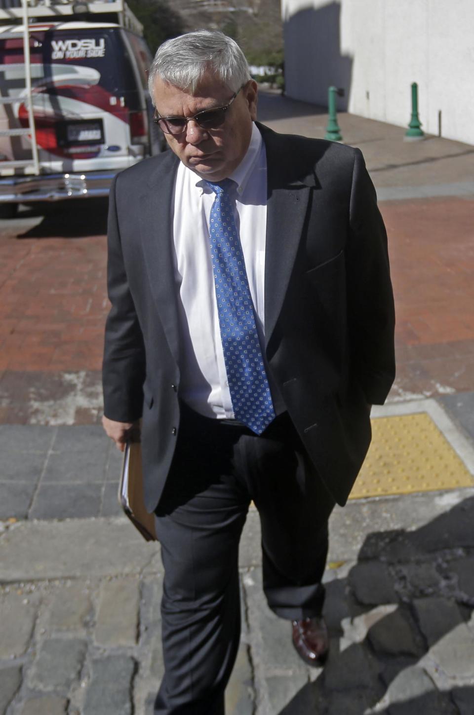 Anthony Badalamenti leaves Federal Court in New Orleans, Tuesday, Jan. 21, 2014. The former Halliburton manager was sentenced Tuesday to one year of probation for destroying evidence in the aftermath of BP's massive 2010 oil spill in the Gulf of Mexico. Badalamenti, of Katy, Texas, had faced a maximum of one year in prison at his sentencing by U.S. District Judge Jay Zainey. Badalamenti pleaded guilty in October to one misdemeanor count of destruction of evidence. (AP Photo/Gerald Herbert)
