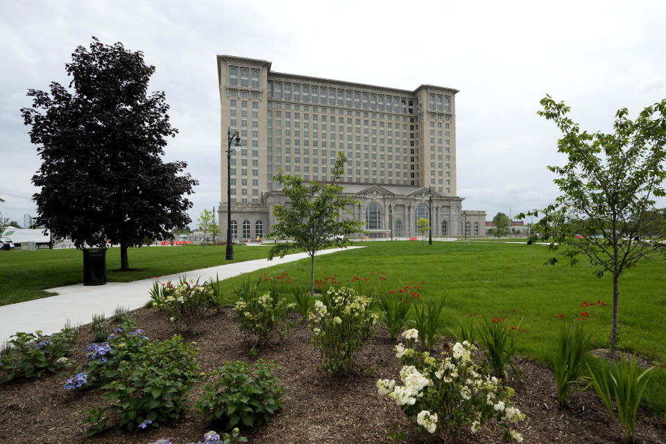 Michigan Central Station is shown, July 13, 2023, in Detroit. On July 18, 2013, a state-appointed manager made Detroit the largest U.S. city to file for bankruptcy. A decade later, the Motor City has risen from the ashes of insolvency, with balanced budgets, revenue increases and millions of dollars socked away. Corktown, a neighborhood just east of downtown, got a boost in 2018 when Ford Motor Co. bought and began renovating the train station, which for years was a symbol of the city's blight. The building will be part of a campus focusing on autonomous vehicles. (AP Photo/Carlos Osorio)