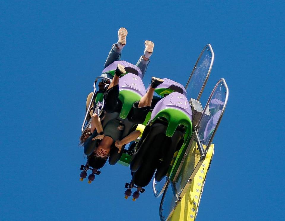 Tribune reporter Chloe Jones rides Medusa at the Mid-State Fair on July 20, 2023.