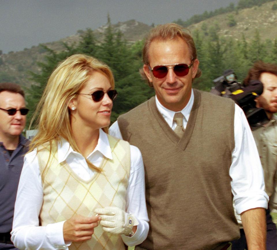 Christine Baumgartner and Kevin Costner were photographed at a golf tournament in 2000 while dating.  (Photo: Toni Anne Barson Archive/WireImage)