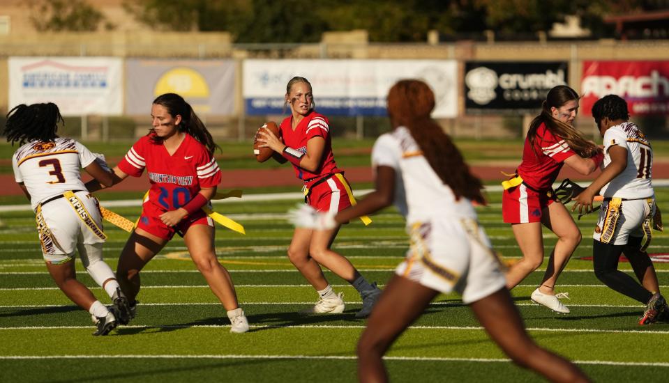 Mountain View Toros quarterback Tierah Metcalf (7) looks to pass against the Mountain Pointe Pride during a flag football game at Mountain View High in Mesa on Aug. 29, 2023.