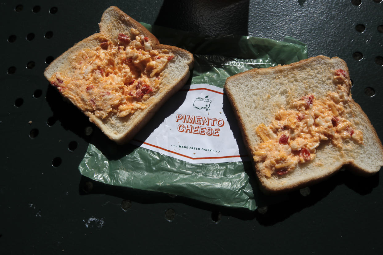Served in a green plastic bag, Augusta National's $1.50 pimento cheese sandwiches are a staple at the Masters. (Photo: REUTERS/Mike Segar)