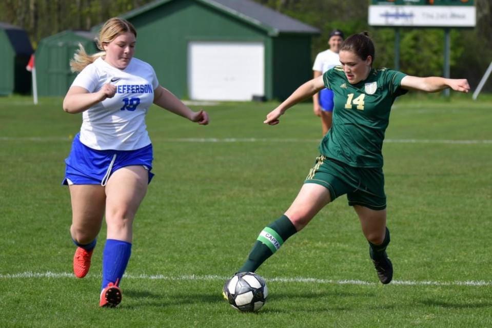 St. Mary Catholic Central senior captain Sarah Netter (right) controls the ball against Jefferson. Netter scored three goals in an 8-0 win over the Bears on Wednesday, May 11, 2022.