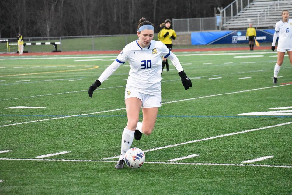Misericordia's Kaylee Sturans, an Arlington graduate, moves the ball up field against Johns Hopkins during the NCAA Division III women's soccer final on Nov. 20, 2022.