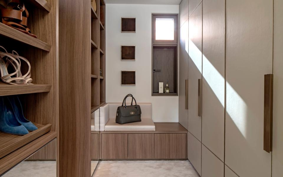 A walk-in dressing room is these days appearing ever higher on the wish lists of househunters - Richard Waite/Echlin