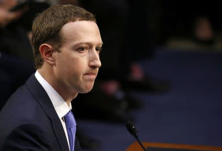 Facebook CEO Mark Zuckerberg listens while testifying before a joint Senate Judiciary and Commerce Committees hearing regarding the company’s use and protection of user data, on Capitol Hill in Washington, U.S., April 10, 2018. REUTERS/Leah Millis