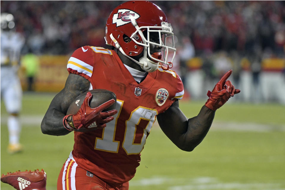 Wide receiver Tyreek Hill will try to lead the Chiefs to a wild-card win over the Titans. (AP)