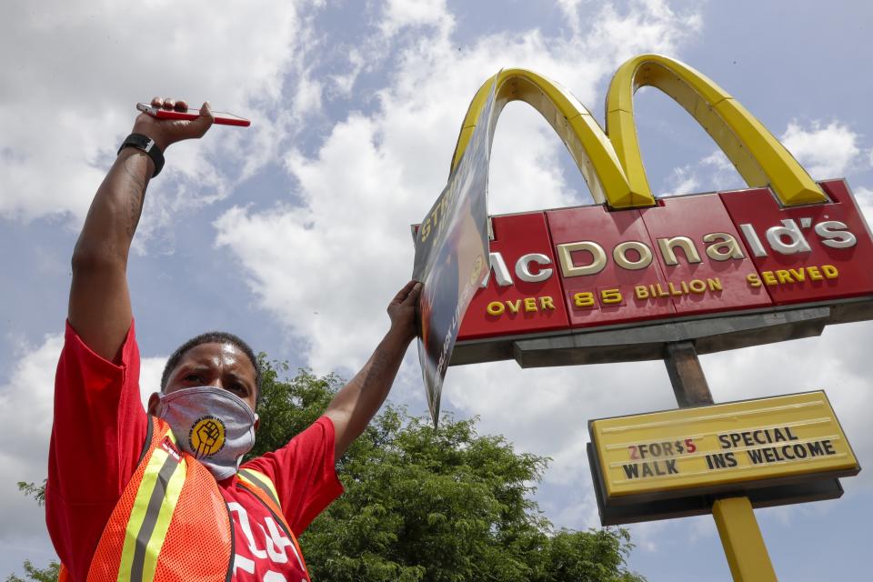 Strike for justice protesters are seen outside a McDonald's Monday, July 20, 2020, in Milwaukee. (AP Photo/Morry Gash)