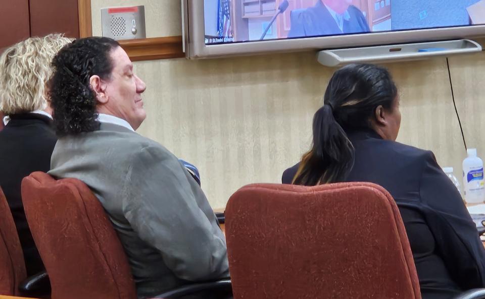 Anthony Gonzalez, accompanied by his attorney, Aileen Henry, right, listens as the jury returns guilty verdicts Tuesday in Door County Circuit Court on all seven counts against him in the Feb. 22, 2022, fire that destroyed Butch's Bar in Sturgeon Bay and killed two of the nine men residing in apartments above the bar.