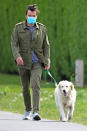 <p>Jimmy Fallon steps out in an army green ensemble to walk his dog on Friday ahead of Memorial Day Weekend in The Hamptons. </p>