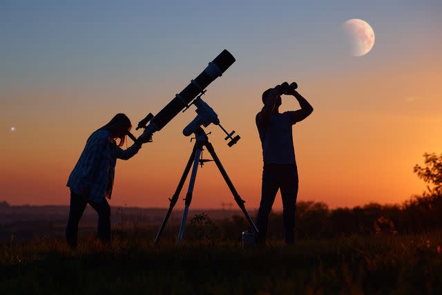 Getty Images Telescope and binoculars are used to spot planets in the solar system from Earth.