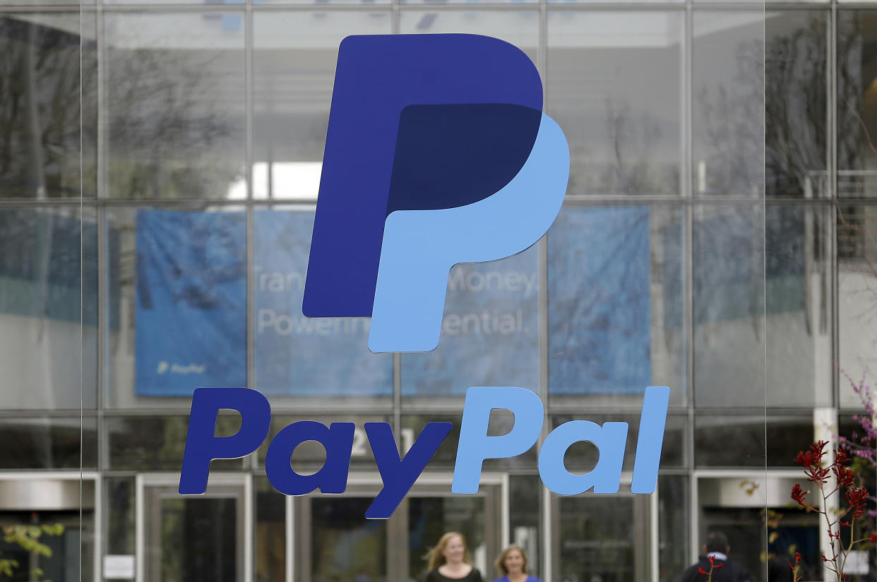 FILE - This March 10, 2015, file photo, shows signage outside PayPal headquarters in San Jose, Calif. PayPal reports financial results on Wednesday, April 27, 2016. (AP Photo/Jeff Chiu, File)