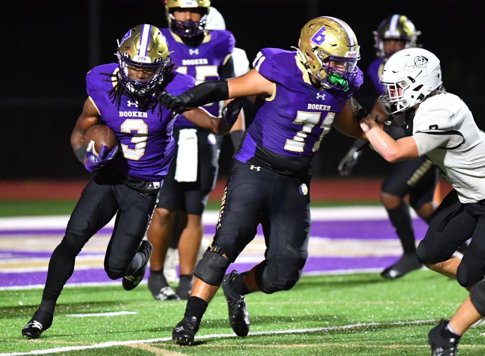 Booker wide receiver Rashawn Peterson (#3) follows his blocker, offensive lineman Javier Pastor (#71). The Booker Tornadoes hosted the Braden River Pirates Friday night, Sept. 22, 2023.