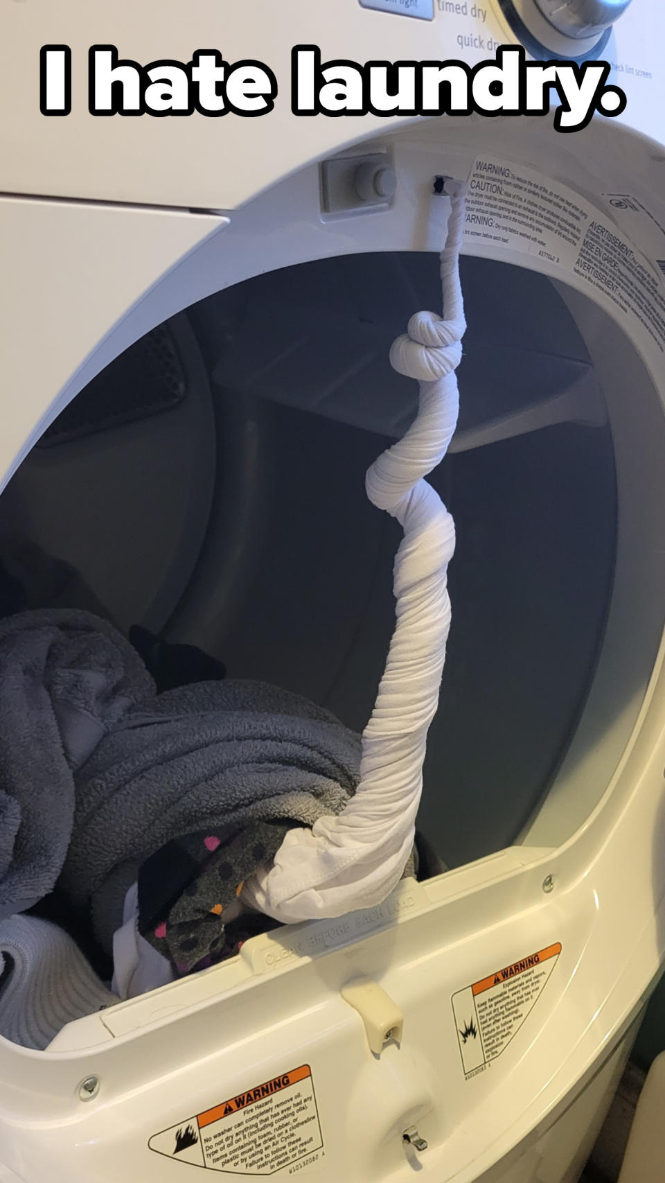 Very wrinkled shirt tied into a knot in a dryer