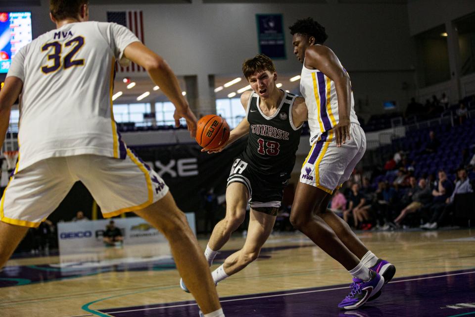 Matas Buzeli from Sunrise Christian Academy drives to the basket during the GEICO High School Nationals quarterfinal against Montverde at Suncoast Credit Union Arena on Thursday. Sunrise won.