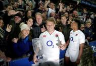 Rugby Union - Rugby Test - England v Australia's Wallabies - Sydney, Australia - 25/06/16. England rugby captain Dylan Hartley poses with the trophy and fans after their series win against Australia's Wallabies in Sydney. REUTERS/Jason Reed