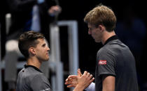 Tennis - ATP Finals - The O2, London, Britain - November 11, 2018 South Africa's Kevin Anderson shakes hands with Austria's Dominic Thiem after winning their group stage match Action Images via Reuters/Tony O'Brien