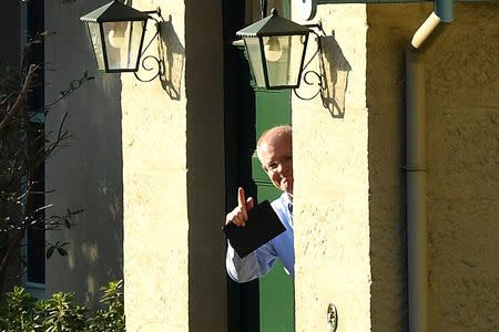Australian Prime Minister Scott Morrison gestures to the media at Kirribilli House in Sydney, Australia, May 19, 2019. AAP Image/Bianca Di Marchi/via REUTERS