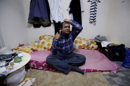 Abu Said Shekh, a 46-year-old asylum seeker from Bangladesh, speaks during an interview with Reuters at his house in Sakaimachi near Ota, Gunma prefecture, north of Tokyo, Japan, in this April 5, 2015 file photo. He was among 22 illegal immigrants, including an undisclosed number of asylum seekers, that were put on a state-chartered plane and flown back to Bangladesh on November 25, 2015, Japan's Justice Ministry said. REUTERS/Yuya Shino/Files