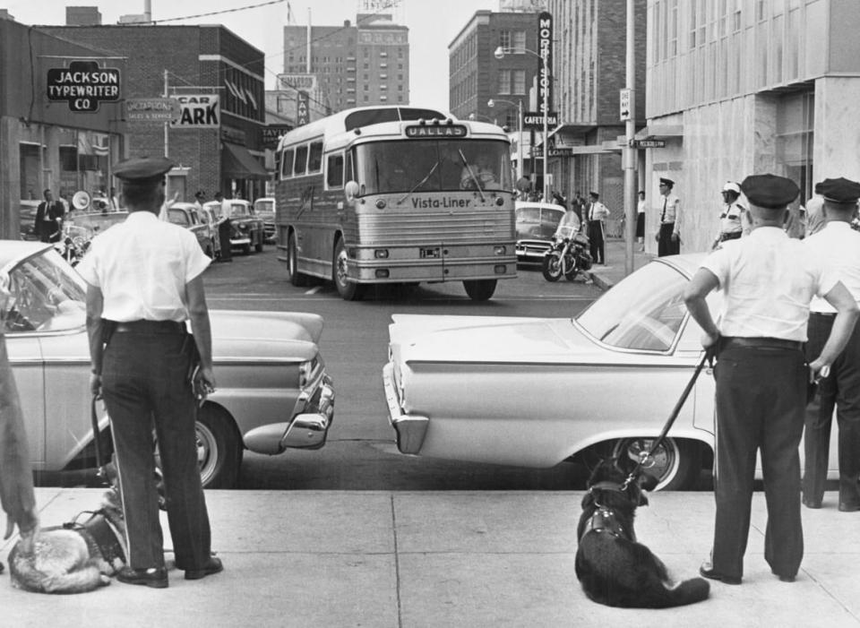 <div class="inline-image__caption"><p>A Trailways bus carrying Freedom Riders arrives in Jackson, Mississippi, police officers wait to arrest those on board on May 24, 1961.</p></div> <div class="inline-image__credit">Bettmann/Getty Images</div>