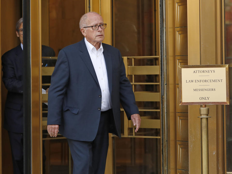 Former Rochester Drug Co-Operative CEO Laurence Doud III leaves US. District Court in Manhattan with his attorney Robert C. Gottlieb, left, Tuesday, April 23, 2019, in New York. Prosecutors allege Doud ignored red flags to turn his drug distributor into a supplier of last resort as the opioid crisis raged. (AP Photo/Kathy Willens)