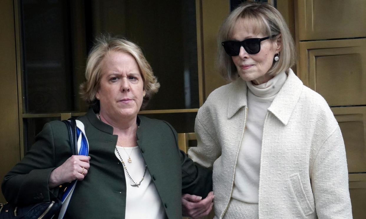 <span>E Jean Carroll leaves court with her lawyer Roberta Kaplan, left, in New York on 27 April 2023. </span><span>Photograph: Bebeto Matthews/AP</span>