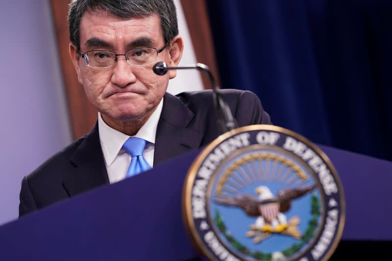 Japan's Defense Minister Taro Kono reacts during a joint news conference with U.S. Secretary of Defense Mark Esper at the Pentagon in Washington