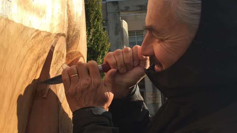 Haida carver puts final touches on UBC reconciliation totem pole